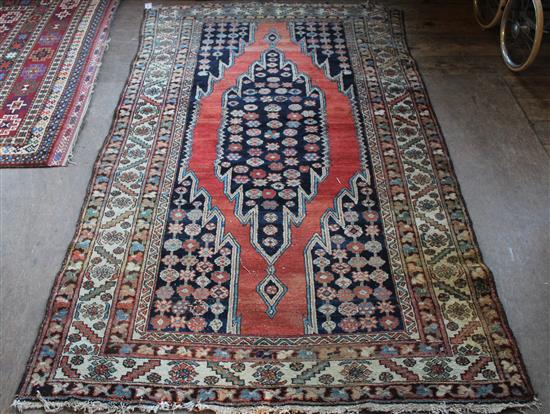 Red & blue Afghan rug